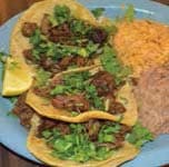 60 grams of carbs (3 small tortillas, ½ cup beans, 1/3 cup rice)