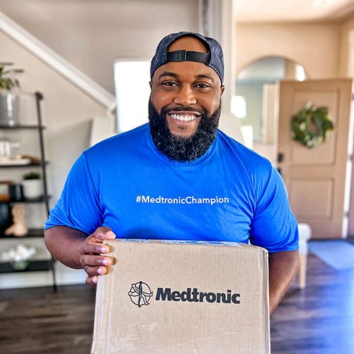Kris with Medtronic package