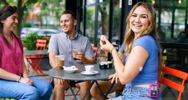 Woman having coffee with friends