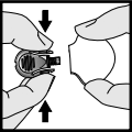 Disconnect the tester from the transmitter by gently squeezing the arms of the tester