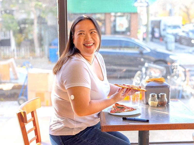 Girl eating a pizza
