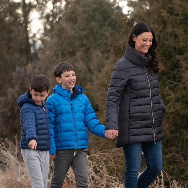 Mother walking with sons