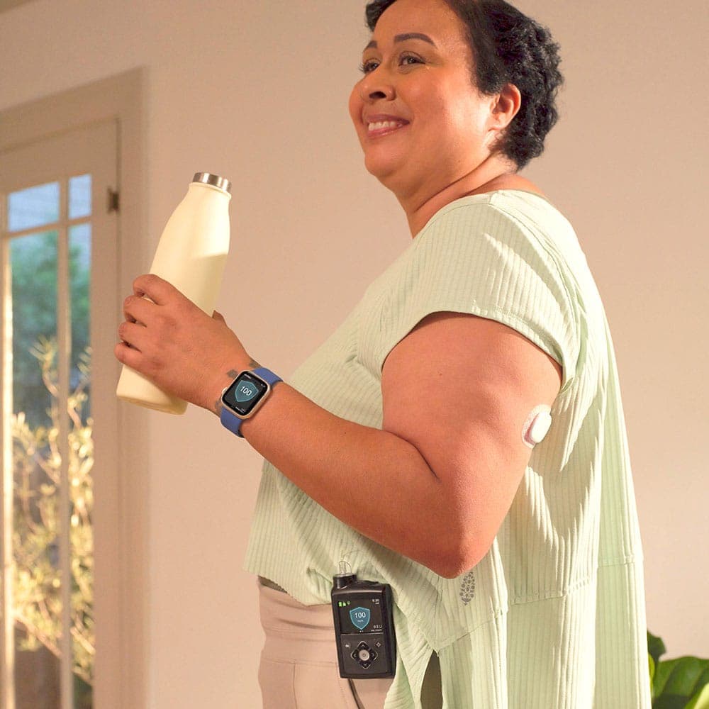 Image of woman with MiniMed products