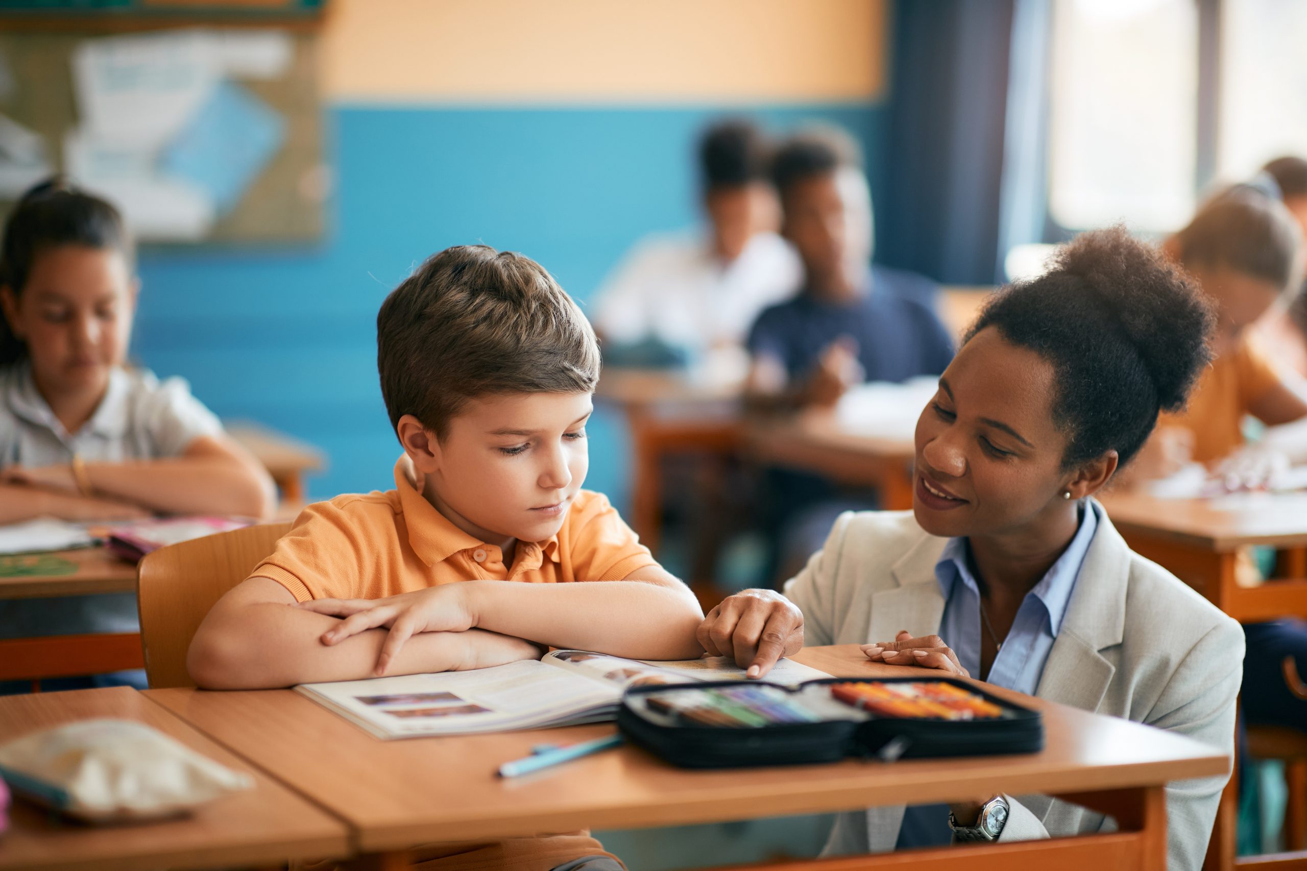 Boy and school teacher