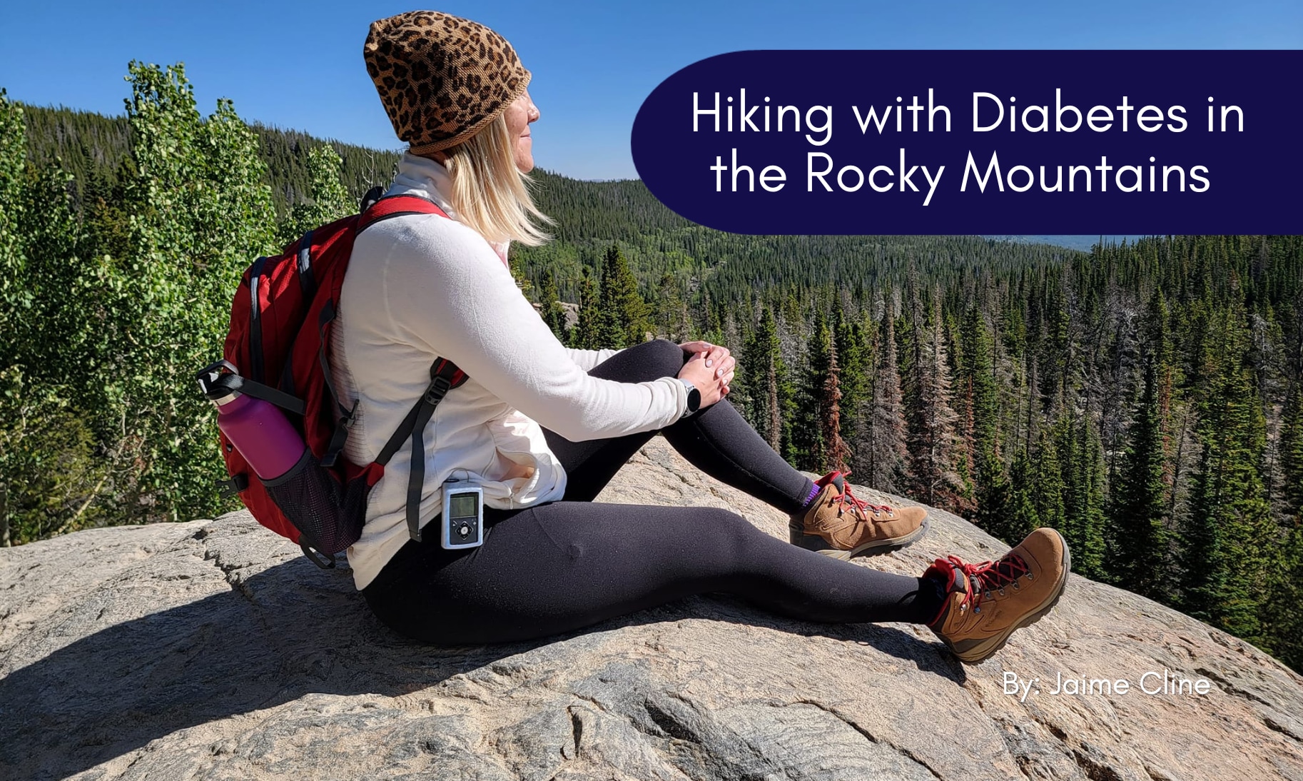 Jaime hiking seating on the rock