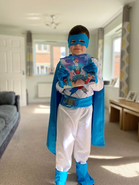 Boy dressed like comic book superhero
